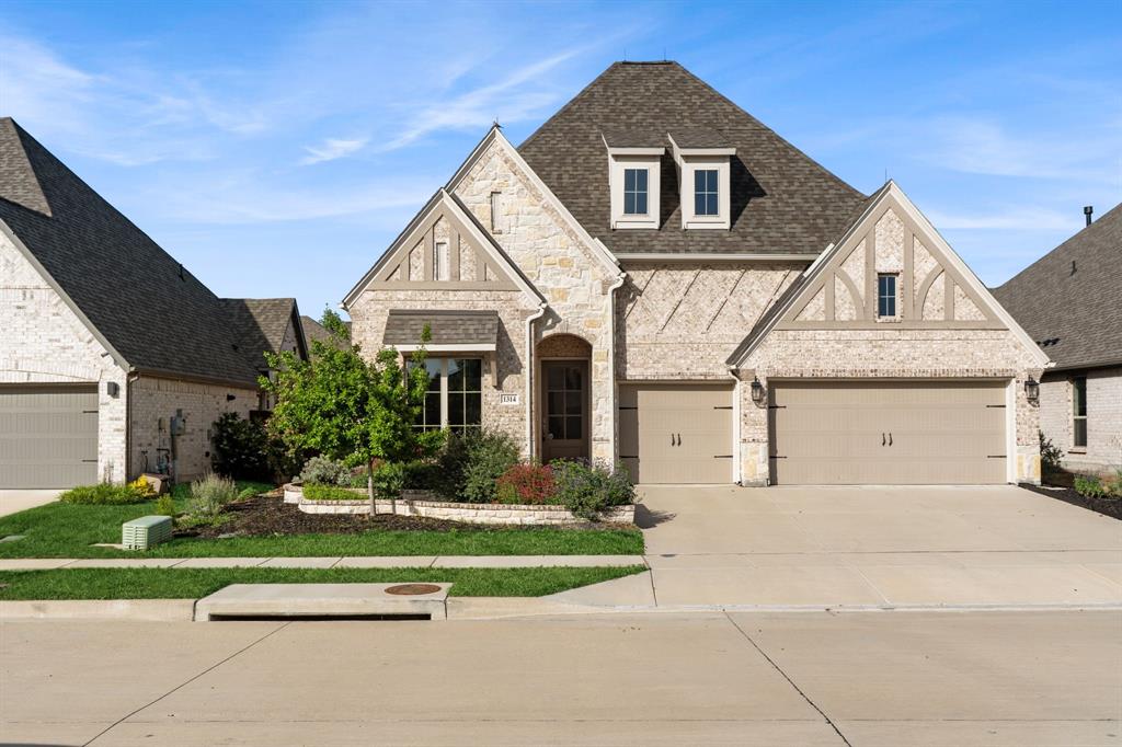 1314 Buttermere Street Forney, TX 75126 - Photo 3 of 32 a front view of a house with a yard