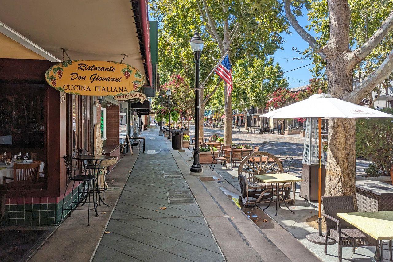83 Centre Street Mountain View, CA 94041 - Photo 26 of 32 a view of a dinning tables with chairs in patio