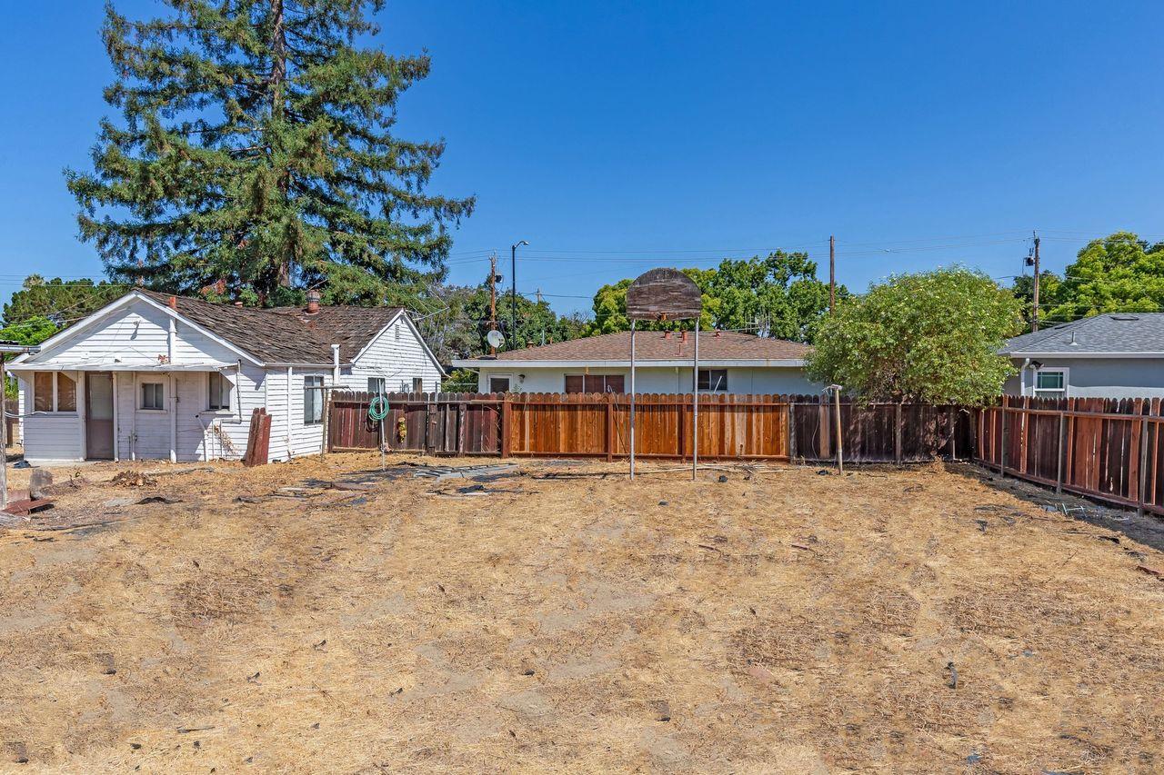 83 Centre Street Mountain View, CA 94041 - Photo 4 of 32 a house with trees in the background