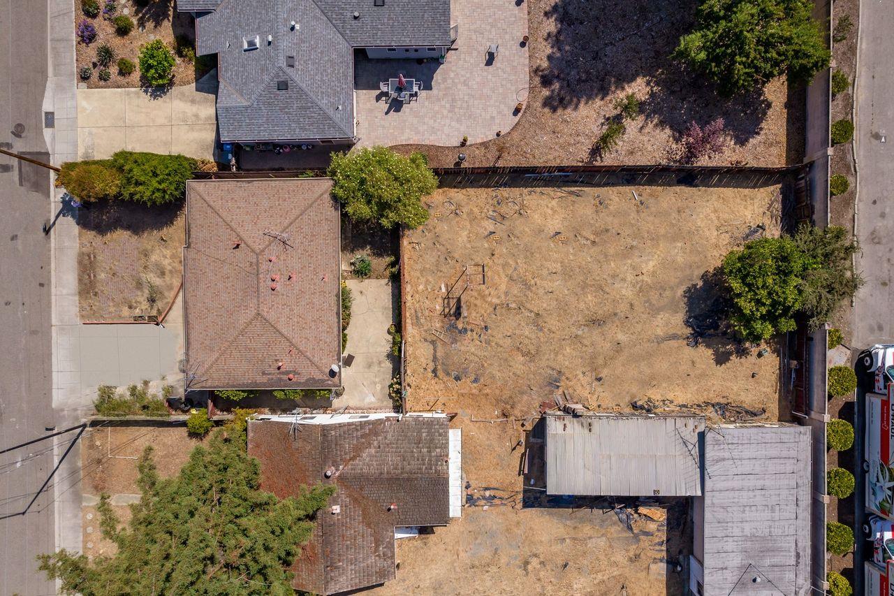 83 Centre Street Mountain View, CA 94041 - Photo 7 of 32 an aerial view of a house with a yard and large tree
