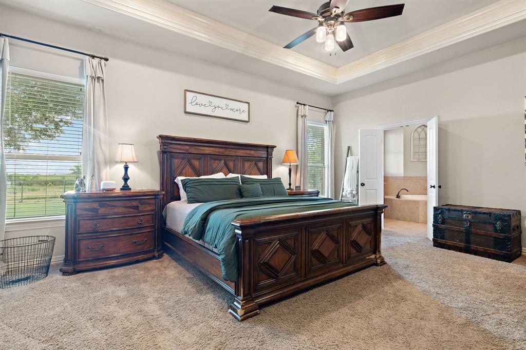 1341 Maxwell Road Haslet, TX 76052 - Photo 20 of 40 a bedroom with a bed and dresser