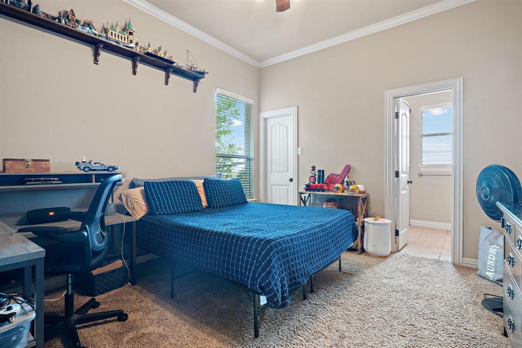 1341 Maxwell Road Haslet, TX 76052 - Photo 34 of 40 a bed room with a bed window and a chair