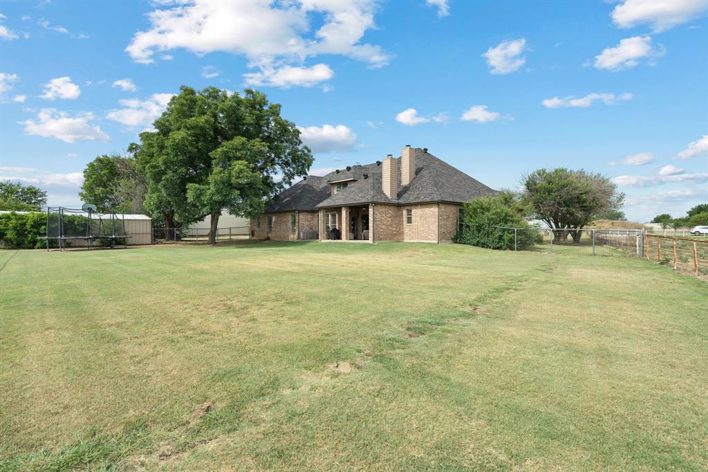 1341 Maxwell Road Haslet, TX 76052 - Photo 40 of 40 a view of a house with a backyard