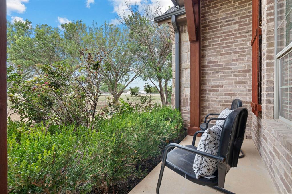 1341 Maxwell Road Haslet, TX 76052 - Photo 9 of 40 a view of backyard with outdoor seating and plants