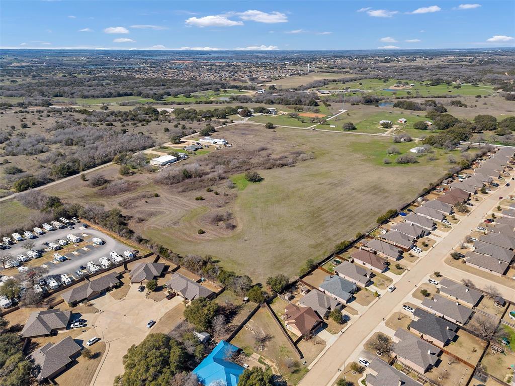 4201 Old Granbury Road Granbury, TX 76049 - Photo 9 of 14 an aerial view of residential houses with outdoor space