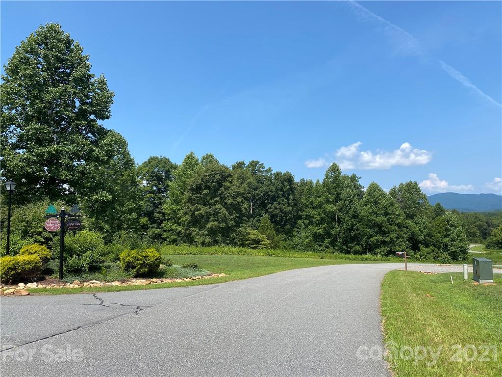 56 Summer View, Unit 56 Rutherfordton, NC 28139 - Photo 14 of 14 a view of a garden with a building in the background