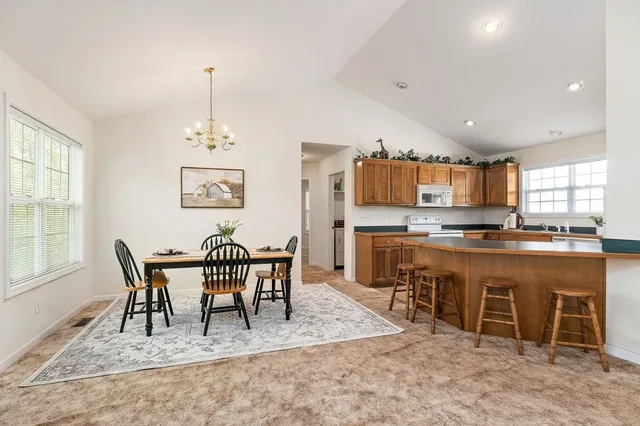 a view of a dining room with furniture