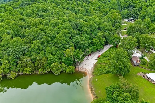 a view of a lake with green space
