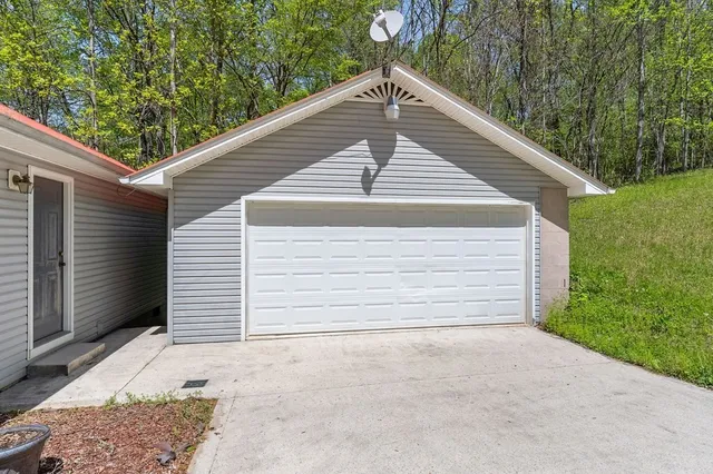 a small white house with a outdoor space