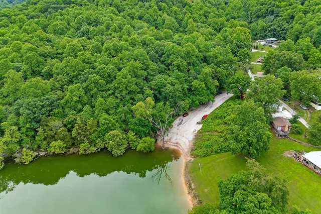 a view of a lake with green space