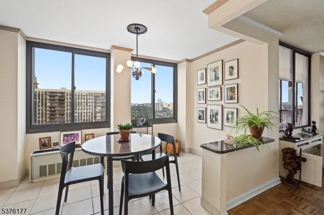 a view of a dining room with furniture window and outside view