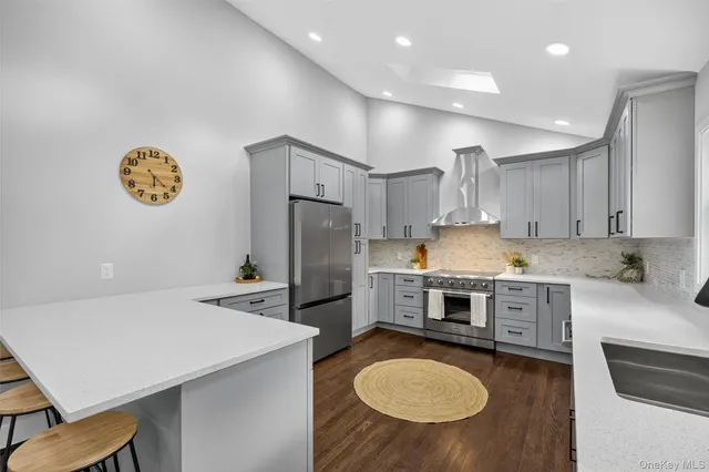 a view of balcony with wooden floor