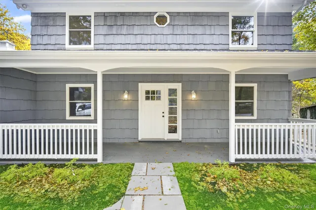 a workspace room with furniture and wooden floor