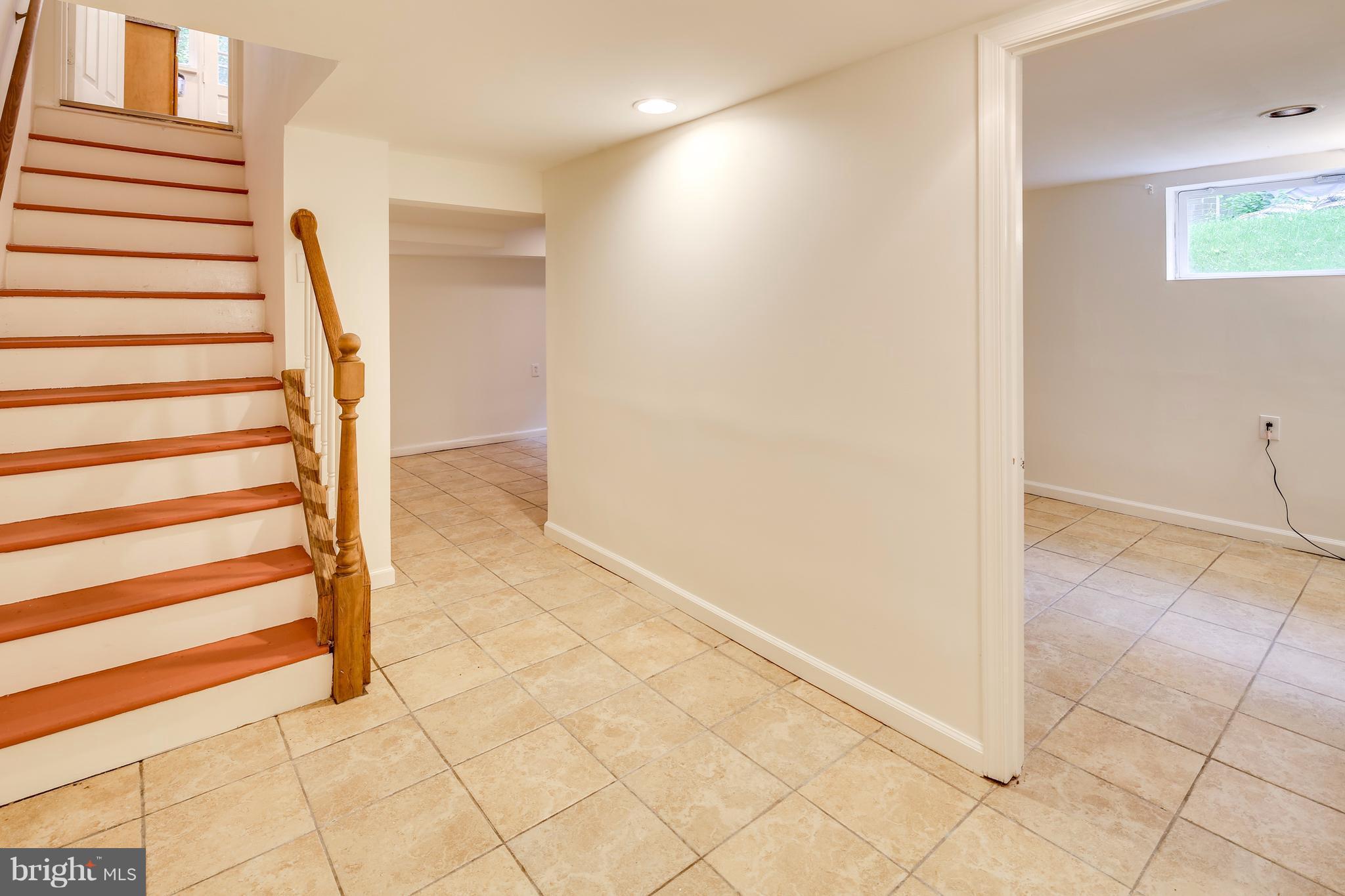 12025 Berry Street Silver Spring, MD 20902 - Photo 12 of 19 a view of entryway with wooden floor