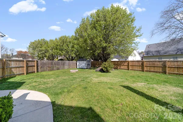 a view of backyard with green space