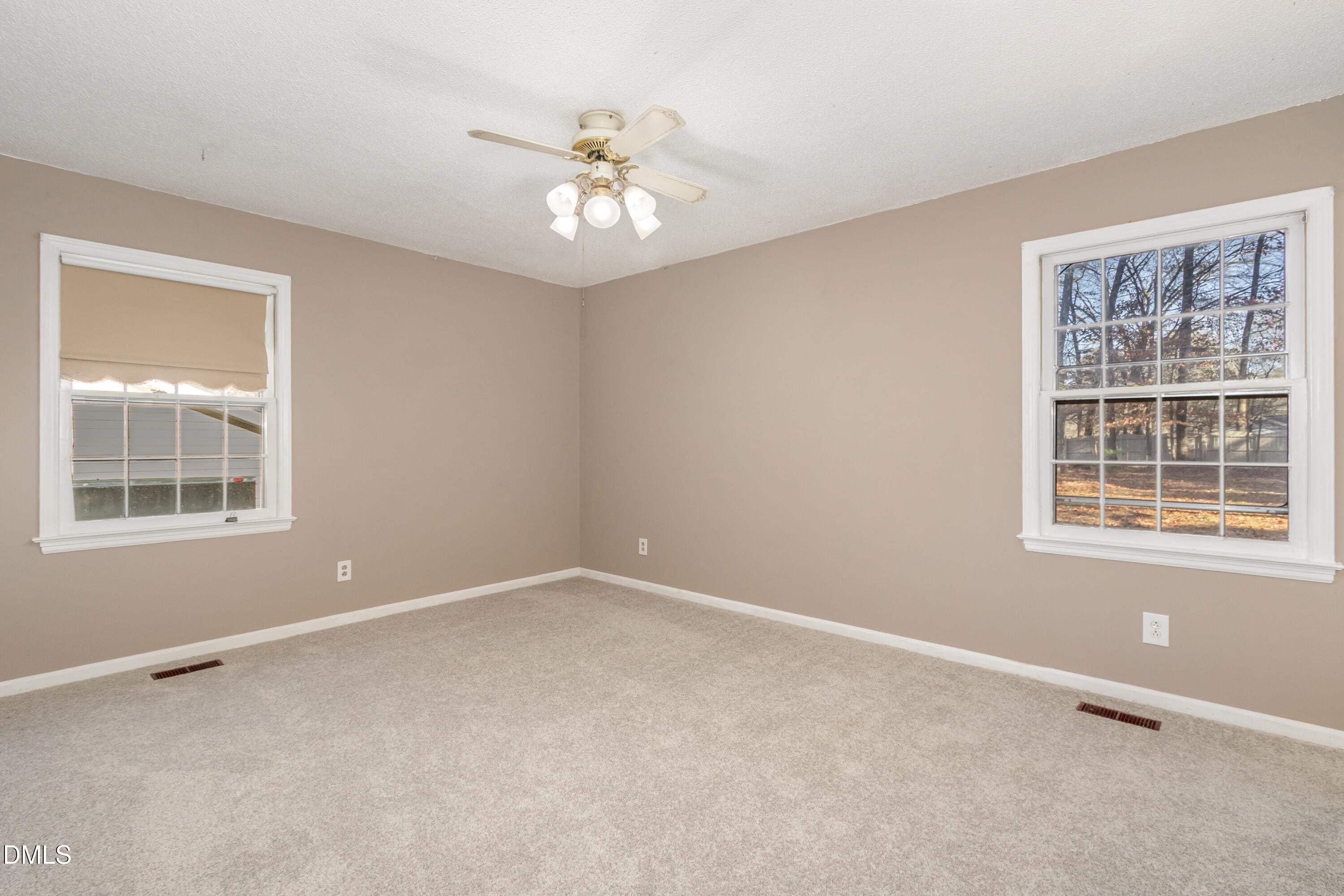6800 Valley Drive Raleigh, NC 27612 - Photo 16 of 35 a view of an empty room with a window