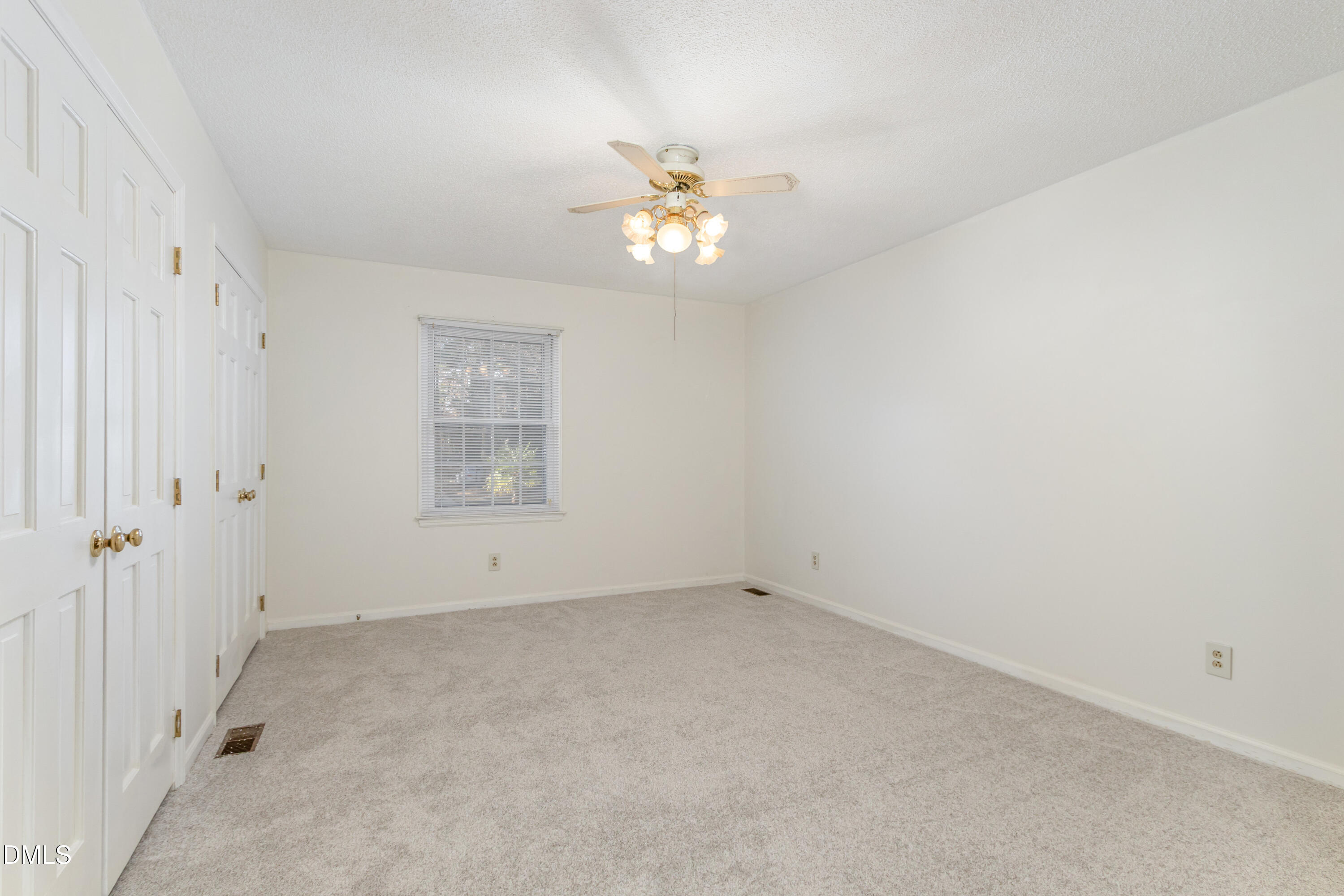 6800 Valley Drive Raleigh, NC 27612 - Photo 18 of 35 an empty room with a window