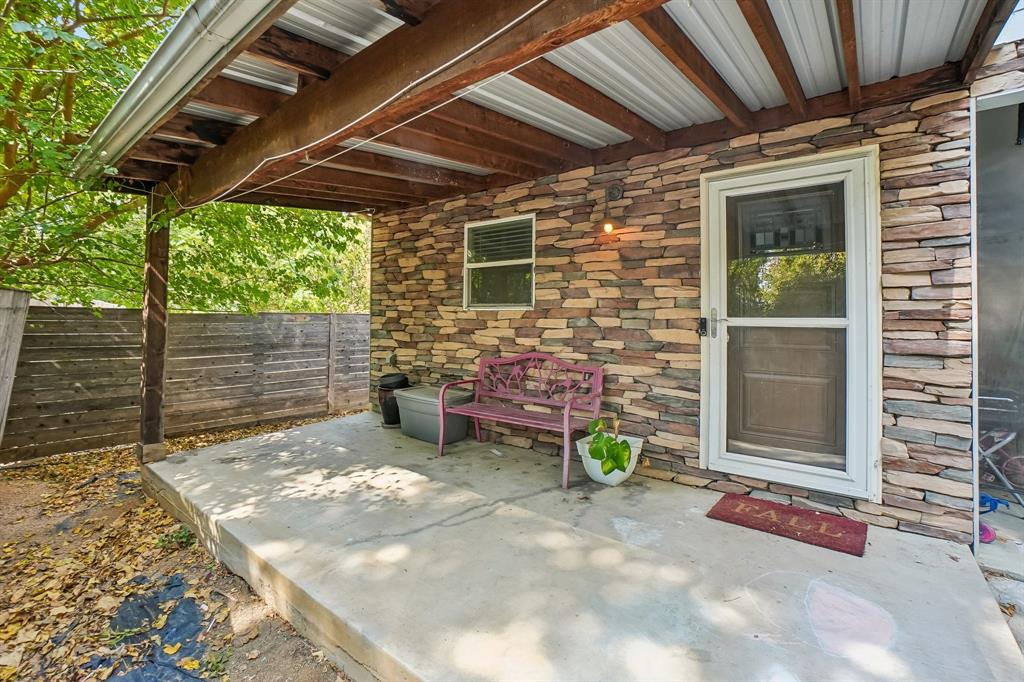 1414 Record Crossing Road Dallas, TX 75235 - Photo 38 of 40 1414B Covered Patio and Front Door