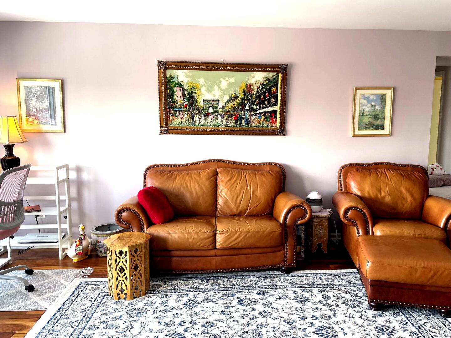 362 Kelburn Road, Unit 324 Deerfield, IL 60015 - Photo 5 of 11 a blue couch sitting in a living room with a rug