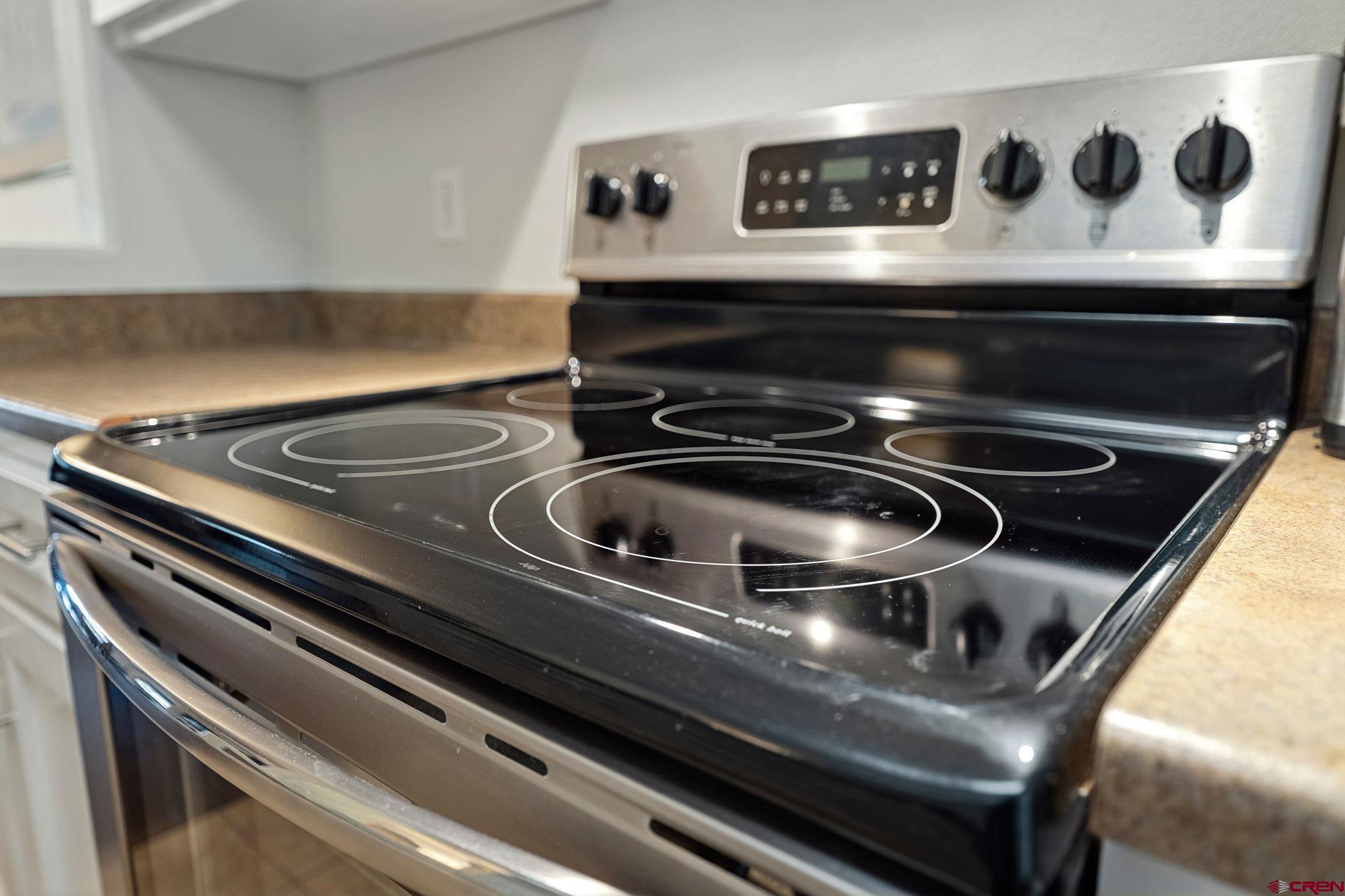 1100 Goeglein Gulch Road, Unit 225 Durango, CO 81301 - Photo 15 of 44 a close view of stove top oven
