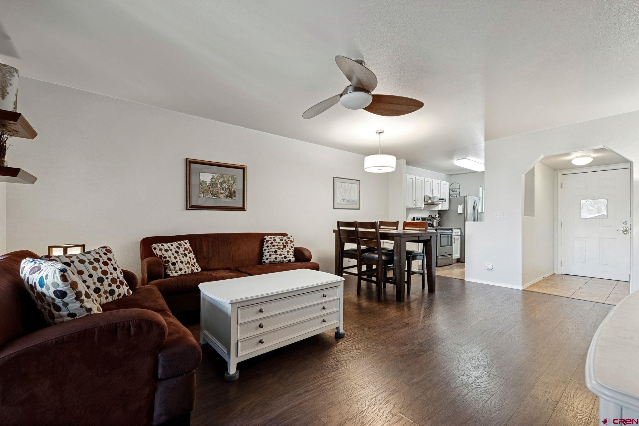 1100 Goeglein Gulch Road, Unit 225 Durango, CO 81301 - Photo 20 of 44 a living room with furniture and wooden floor