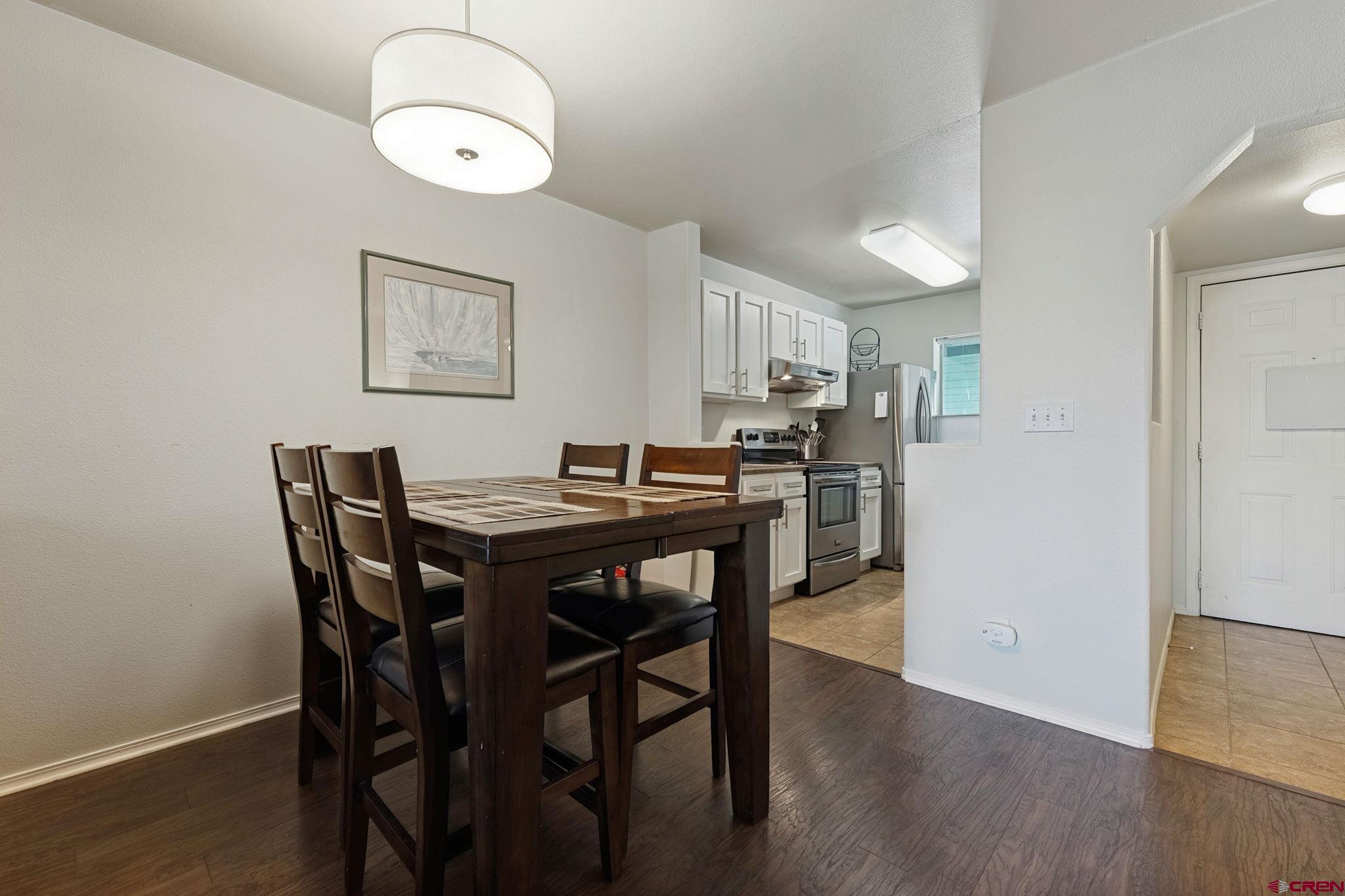 1100 Goeglein Gulch Road, Unit 225 Durango, CO 81301 - Photo 29 of 44 a view of a dining room with furniture