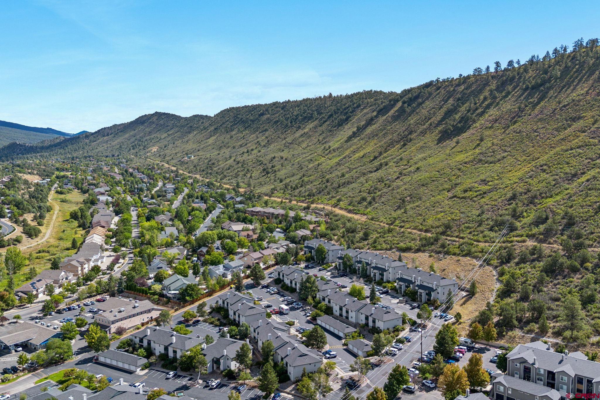1100 Goeglein Gulch Road, Unit 225 Durango, CO 81301 - Photo 3 of 44 an aerial view of houses covered in trees