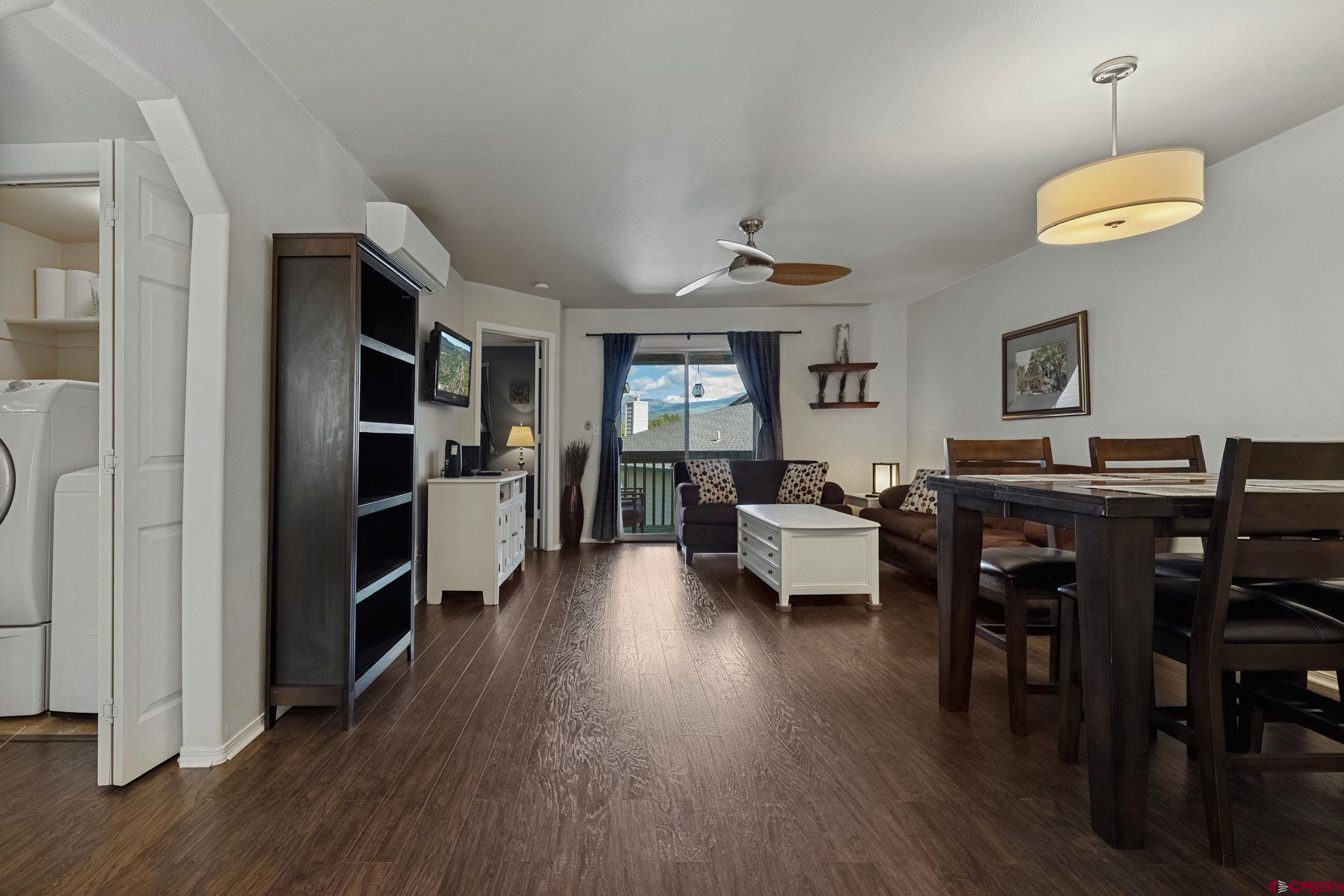 1100 Goeglein Gulch Road, Unit 225 Durango, CO 81301 - Photo 10 of 44 a living room with furniture and wooden floor