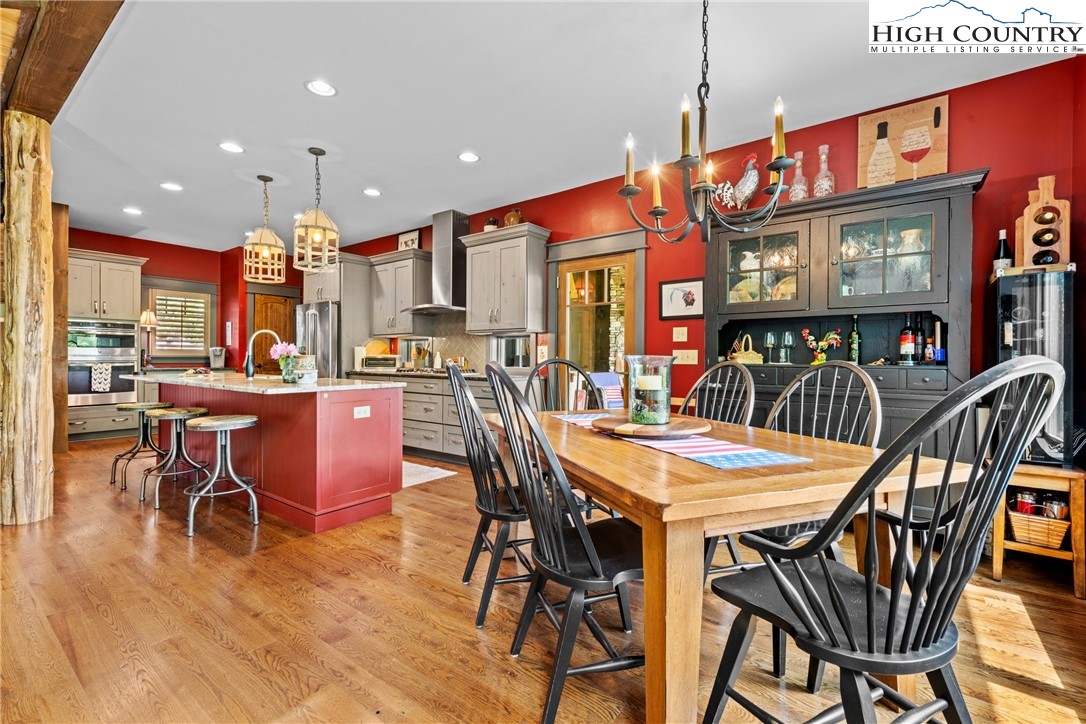 114 Preakness Boone, NC 28607 - Photo 12 of 49 a view of a dining area with furniture and chandelier