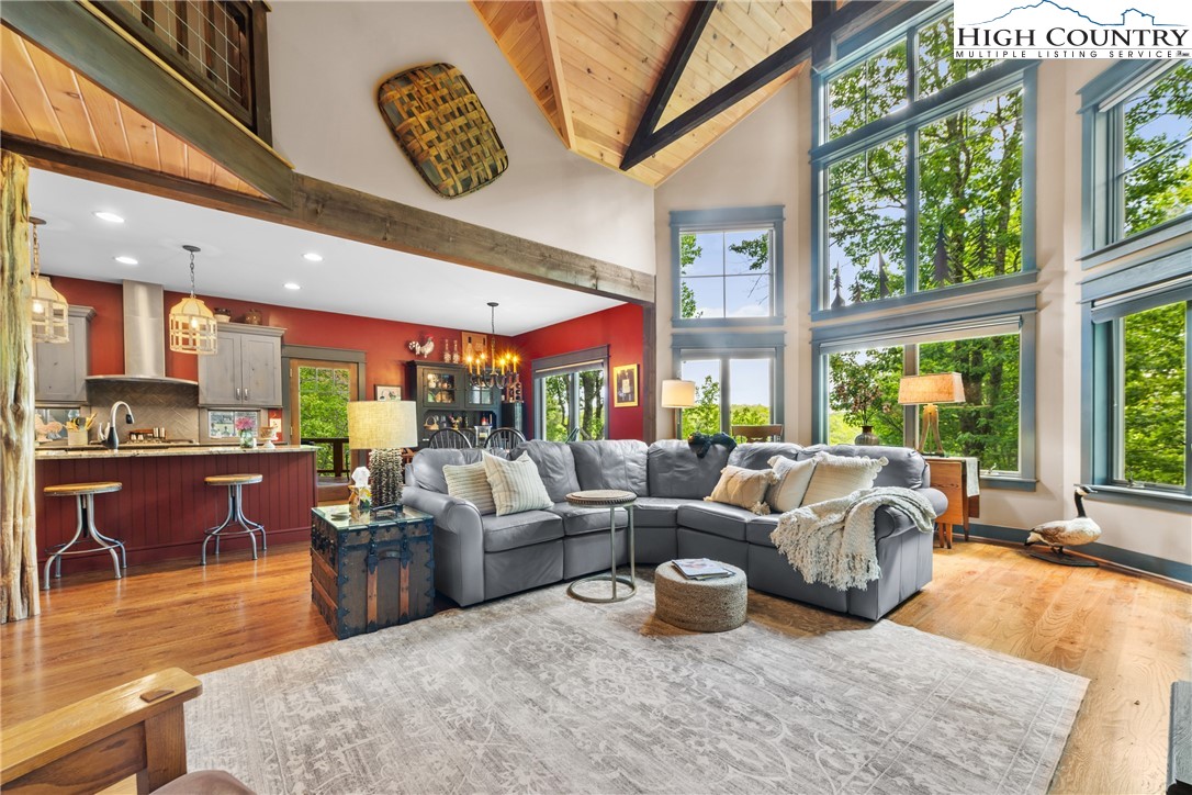 114 Preakness Boone, NC 28607 - Photo 13 of 49 a living room with furniture and a large window