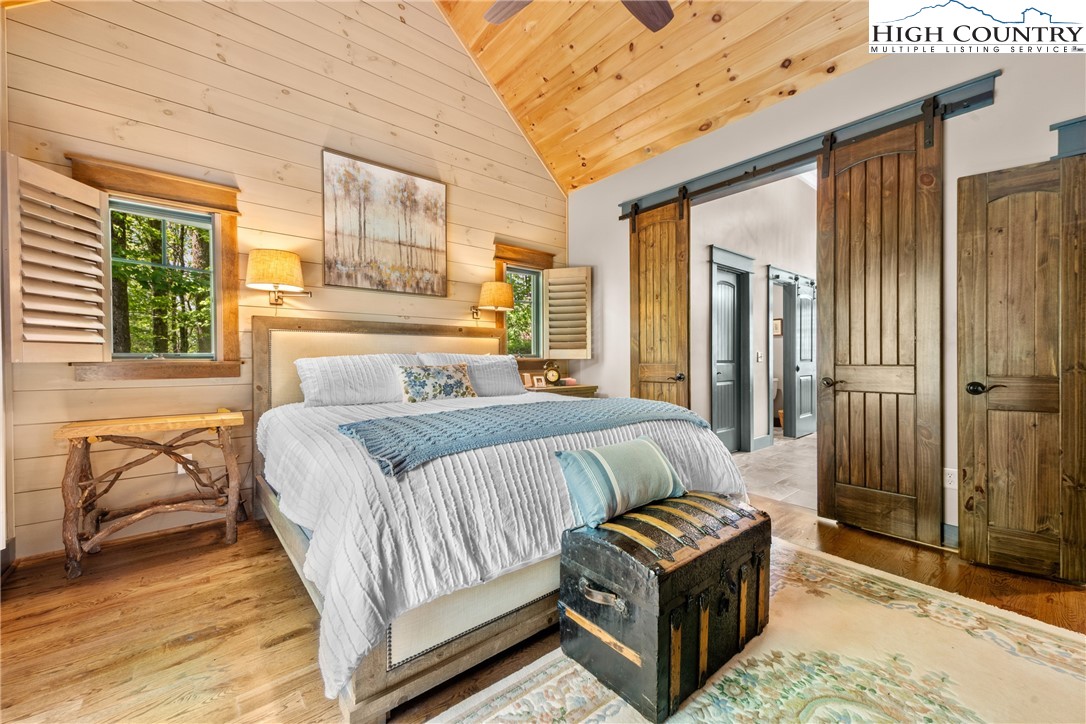 114 Preakness Boone, NC 28607 - Photo 21 of 49 a bedroom with a bed and wooden floor