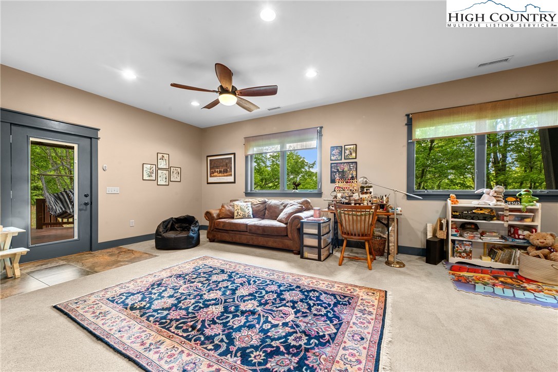 114 Preakness Boone, NC 28607 - Photo 30 of 49 a living room with furniture and a rug