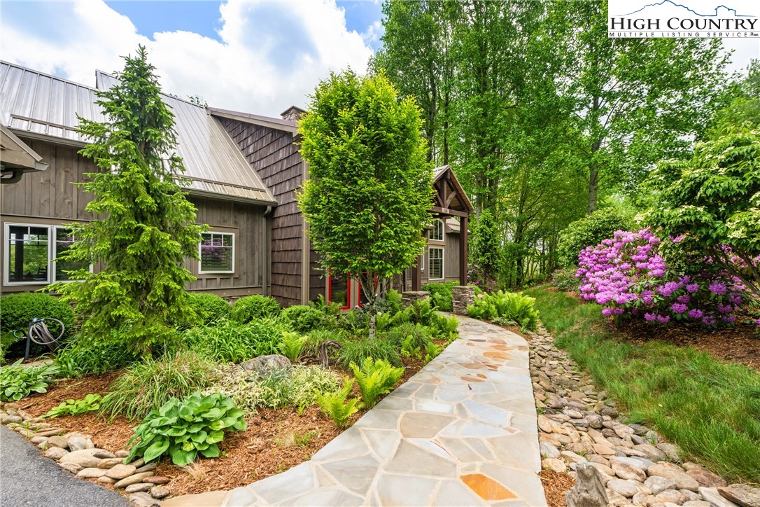 114 Preakness Boone, NC 28607 - Photo 3 of 49 a front view of a house with a yard