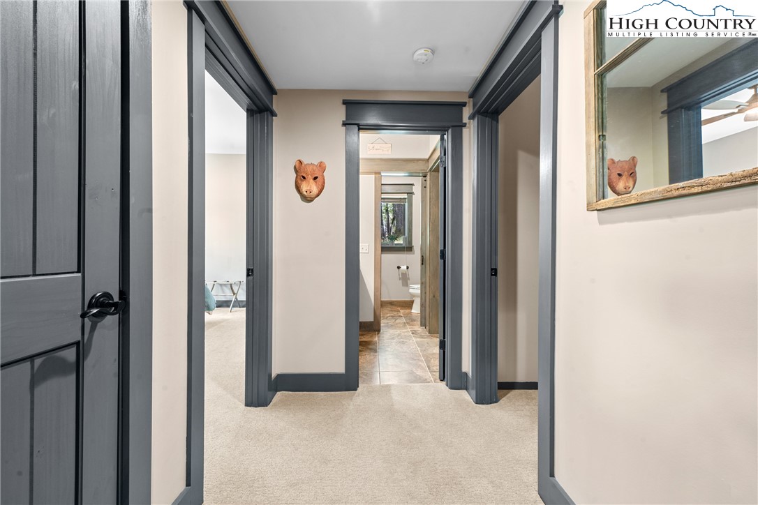 114 Preakness Boone, NC 28607 - Photo 32 of 49 a view of a hallway with wooden shelves