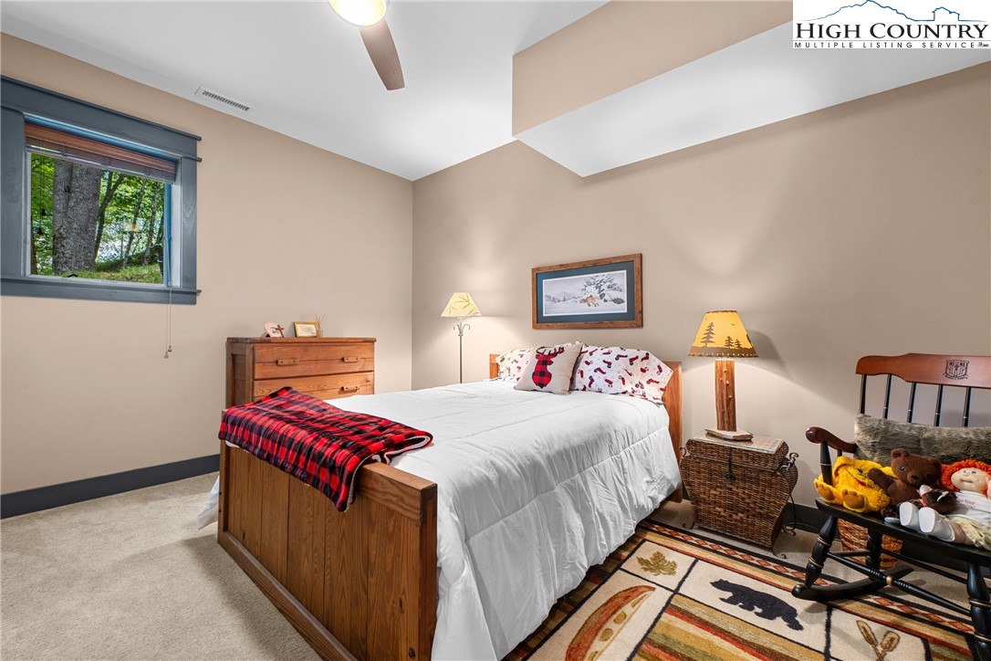 114 Preakness Boone, NC 28607 - Photo 34 of 49 a bedroom with bed and wooden floor