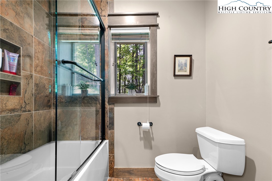 114 Preakness Boone, NC 28607 - Photo 36 of 49 a white toilet sitting next to a shower