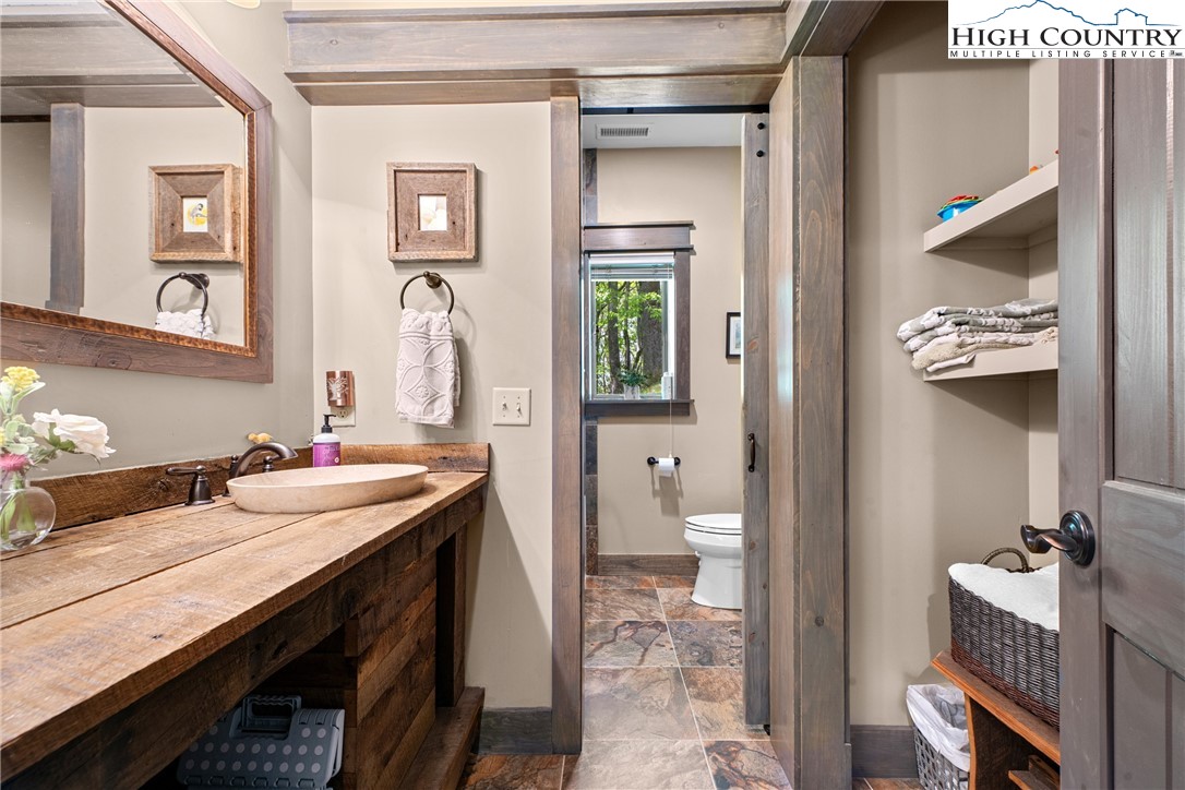 114 Preakness Boone, NC 28607 - Photo 37 of 49 a bathroom with a sink a toilet and shower