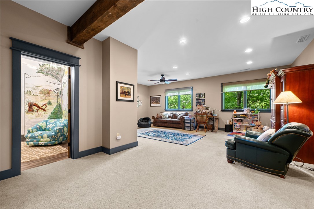 114 Preakness Boone, NC 28607 - Photo 40 of 49 a living room with furniture and a large window