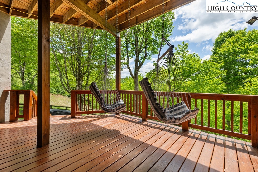 114 Preakness Boone, NC 28607 - Photo 43 of 49 a view of balcony with wooden floor and fence