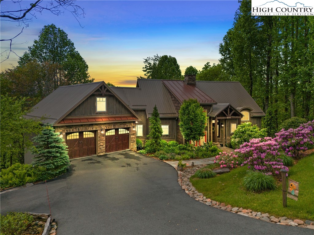 114 Preakness Boone, NC 28607 - Photo 48 of 49 a front view of a house with a garden
