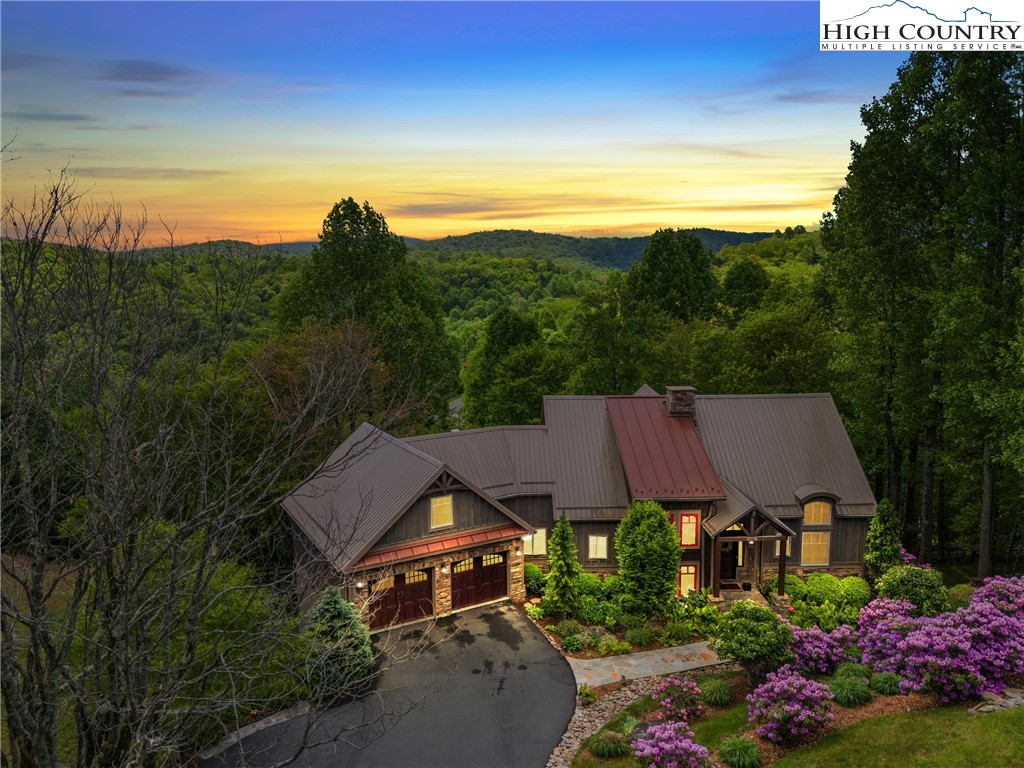 114 Preakness Boone, NC 28607 - Photo 49 of 49 a view of a big house with a big yard plants and large trees