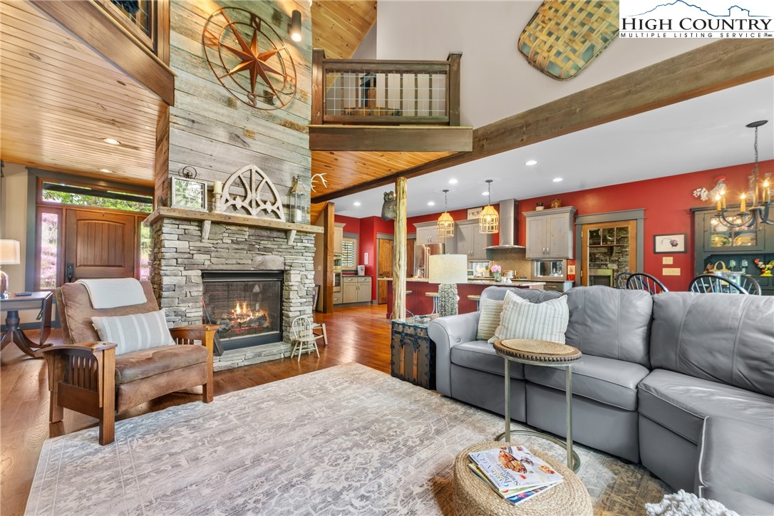 114 Preakness Boone, NC 28607 - Photo 8 of 49 a living room with furniture a fireplace and a flat screen tv