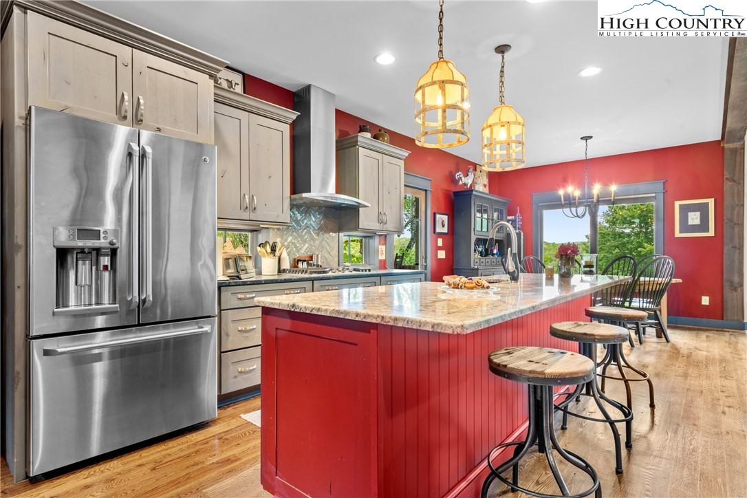 114 Preakness Boone, NC 28607 - Photo 9 of 49 a kitchen with stainless steel appliances granite countertop a sink refrigerator and cabinets