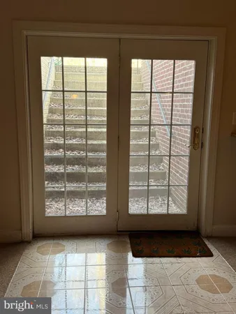 a view of front door with outdoor space