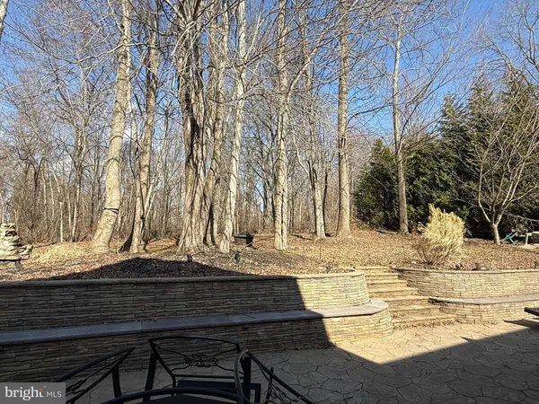 a view of a backyard of the house