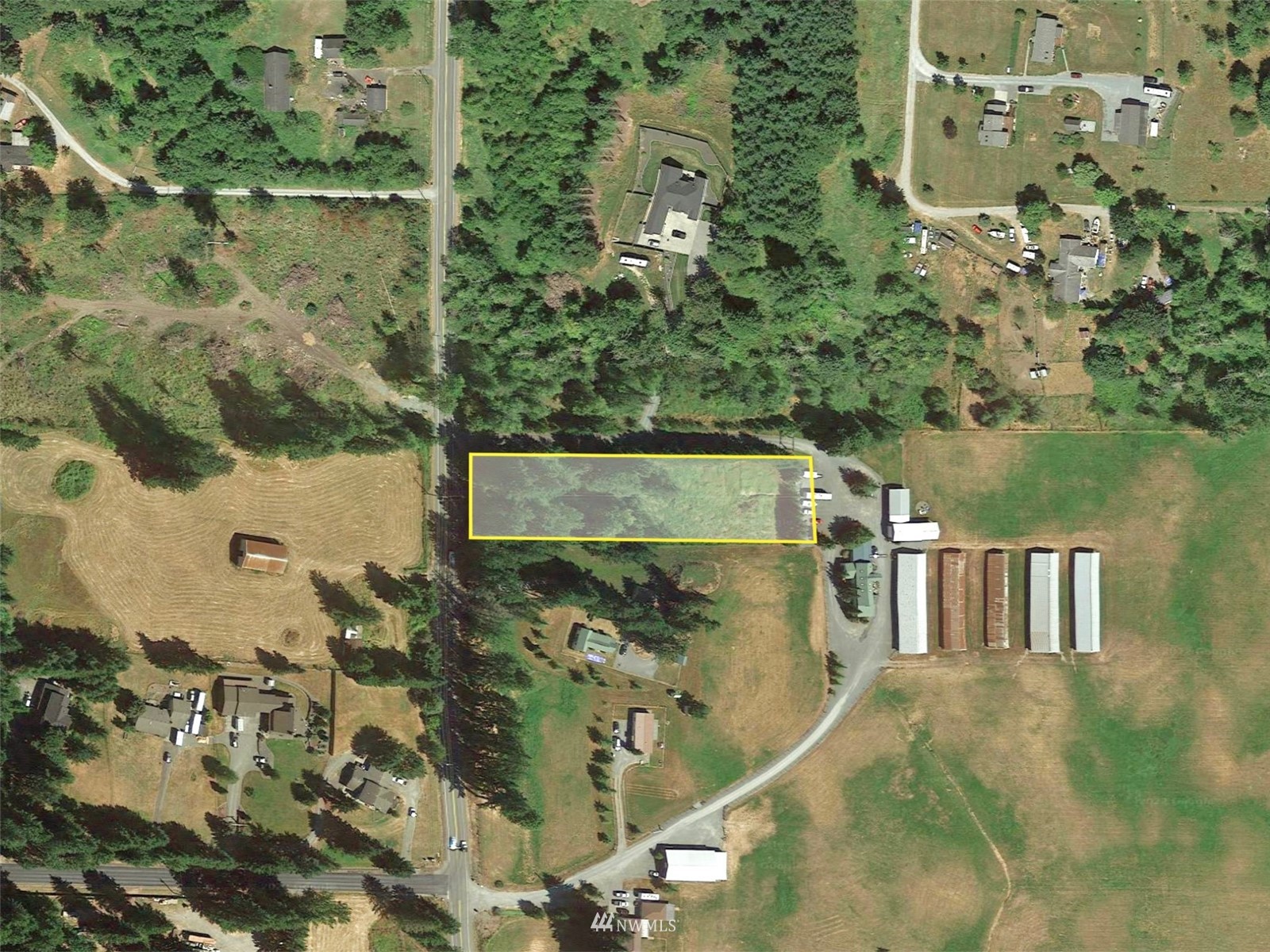 10312 272nd Street East Graham, WA 98338 - Photo 27 of 27 an aerial view of houses with outdoor space