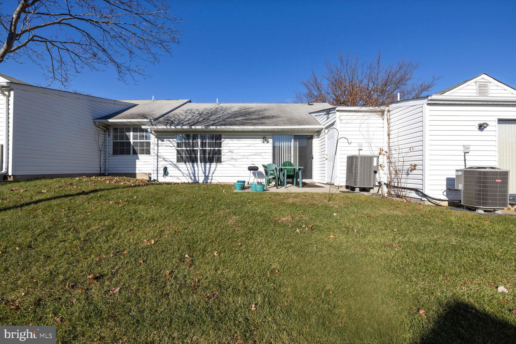 9260 Cherry Lane, Unit 34 Laurel, MD 20708 - Photo 15 of 19 Backyard Showing large Storage Shed.