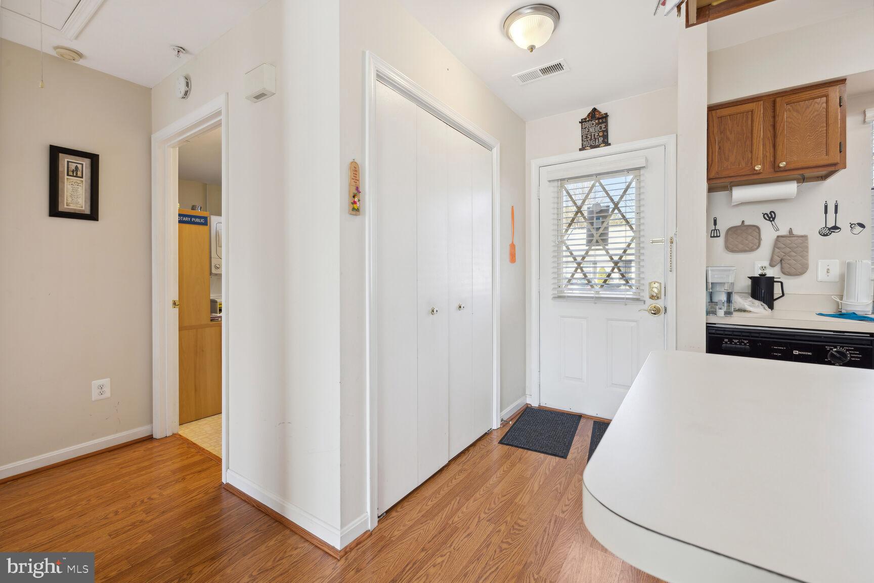 9260 Cherry Lane, Unit 34 Laurel, MD 20708 - Photo 3 of 19 Interior Front Entry w/Kitchen & Laundry Ent View.