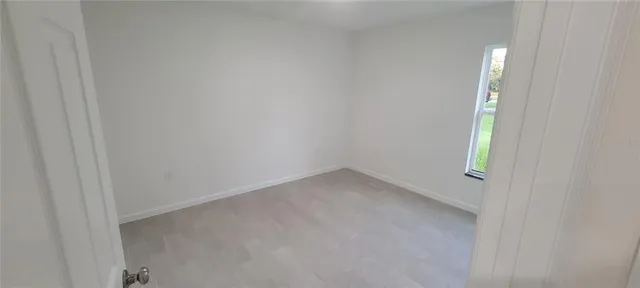 a view of a room with a garage