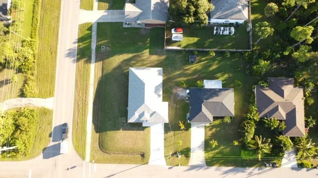 a kitchen with kitchen island stainless steel appliances a sink stove and refrigerator